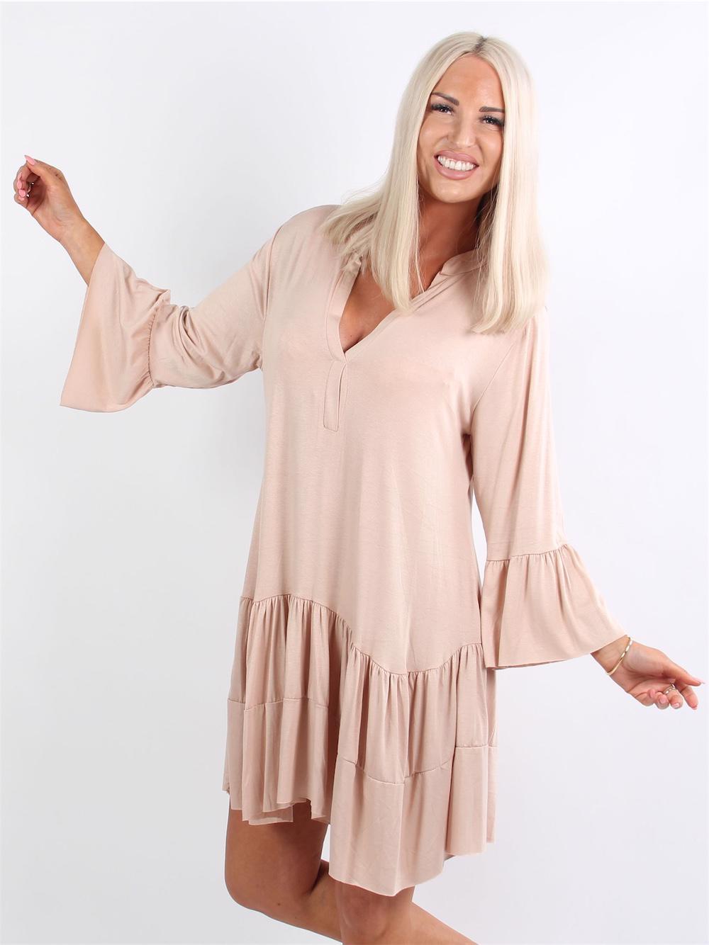 Pauline - Klänning med v-ringning och liten volangkjol